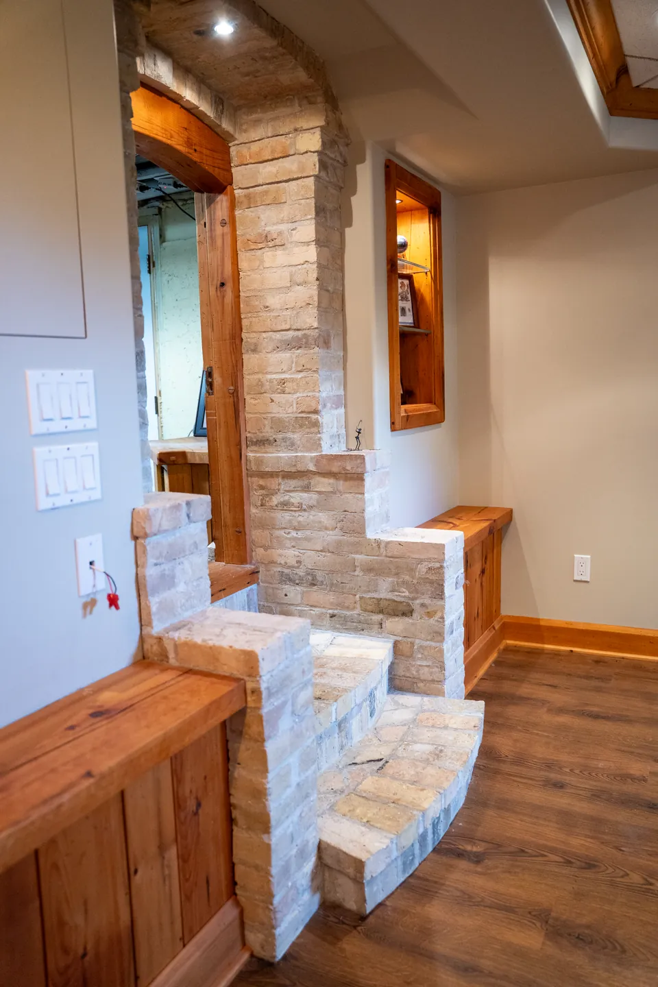 Curved brick steps and timber wall detail