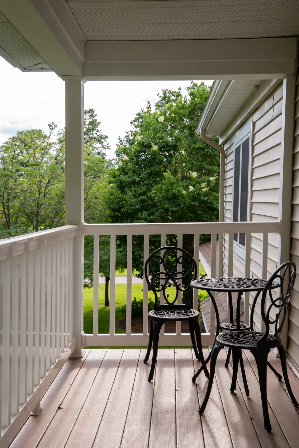 Upper balcony with a small café table